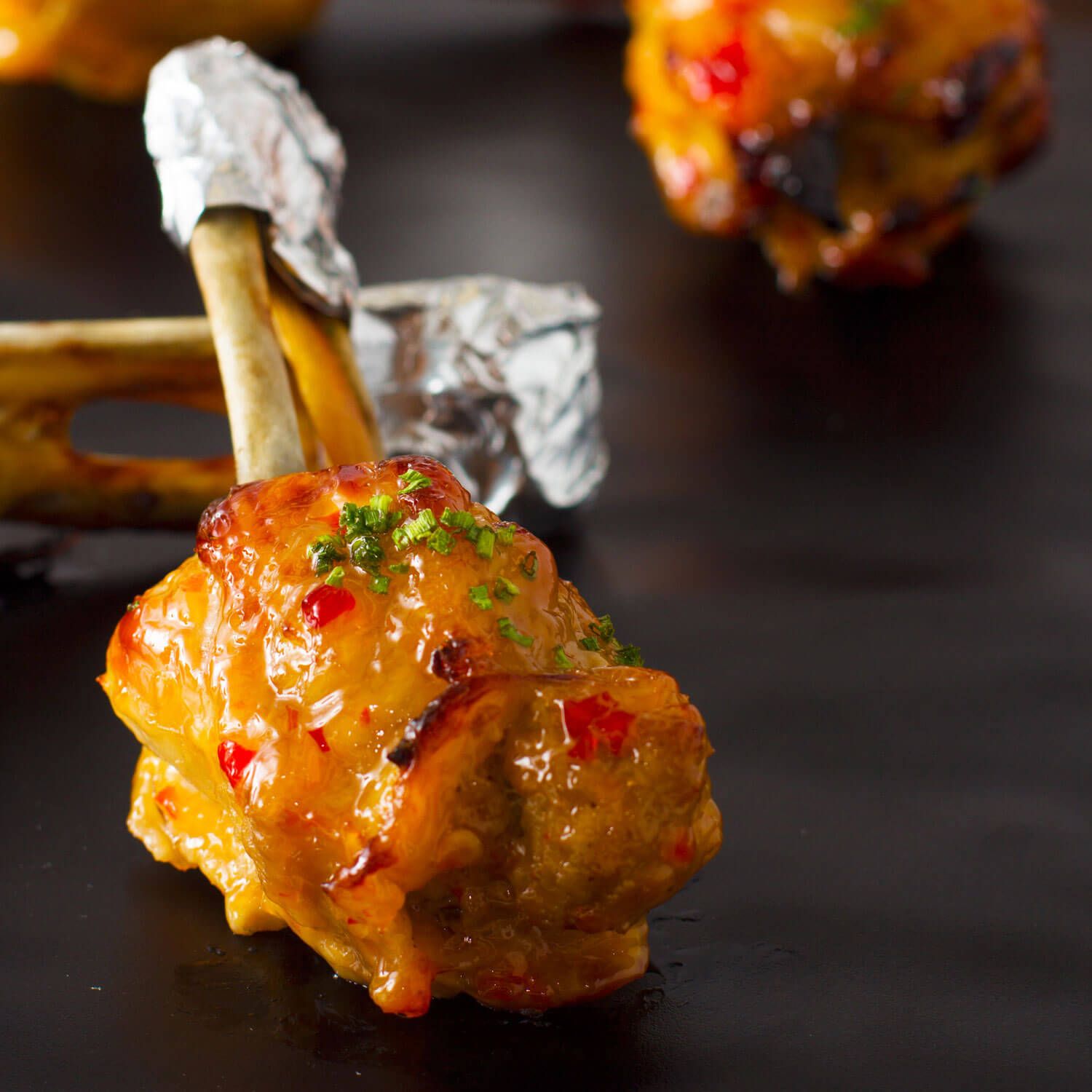 Chicken Lollipop Stuffed with Apricot Sauce